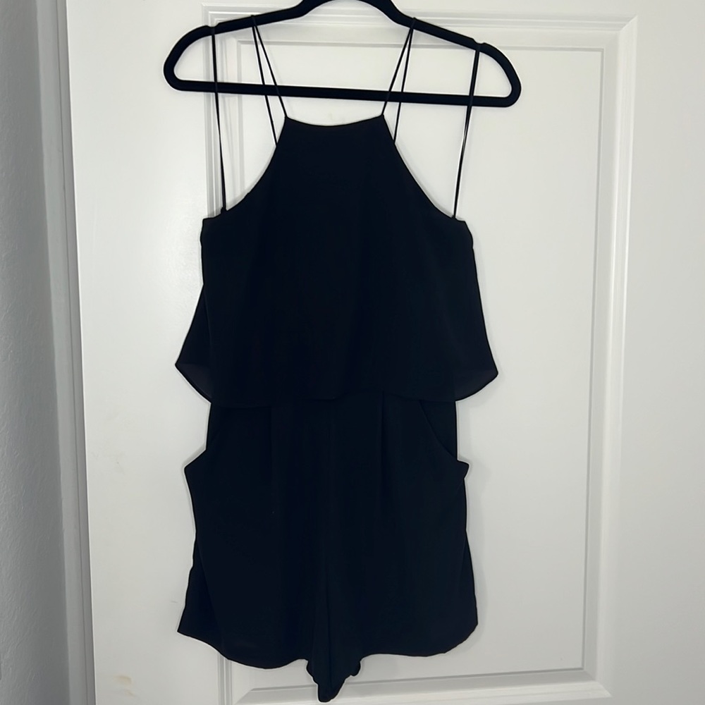 Black express romper with pockets
